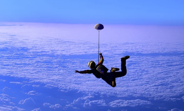 skydiving above the clouds